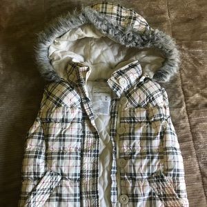 Vest with detachable hood